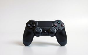 how do you connect a ps4 controller to the ps4